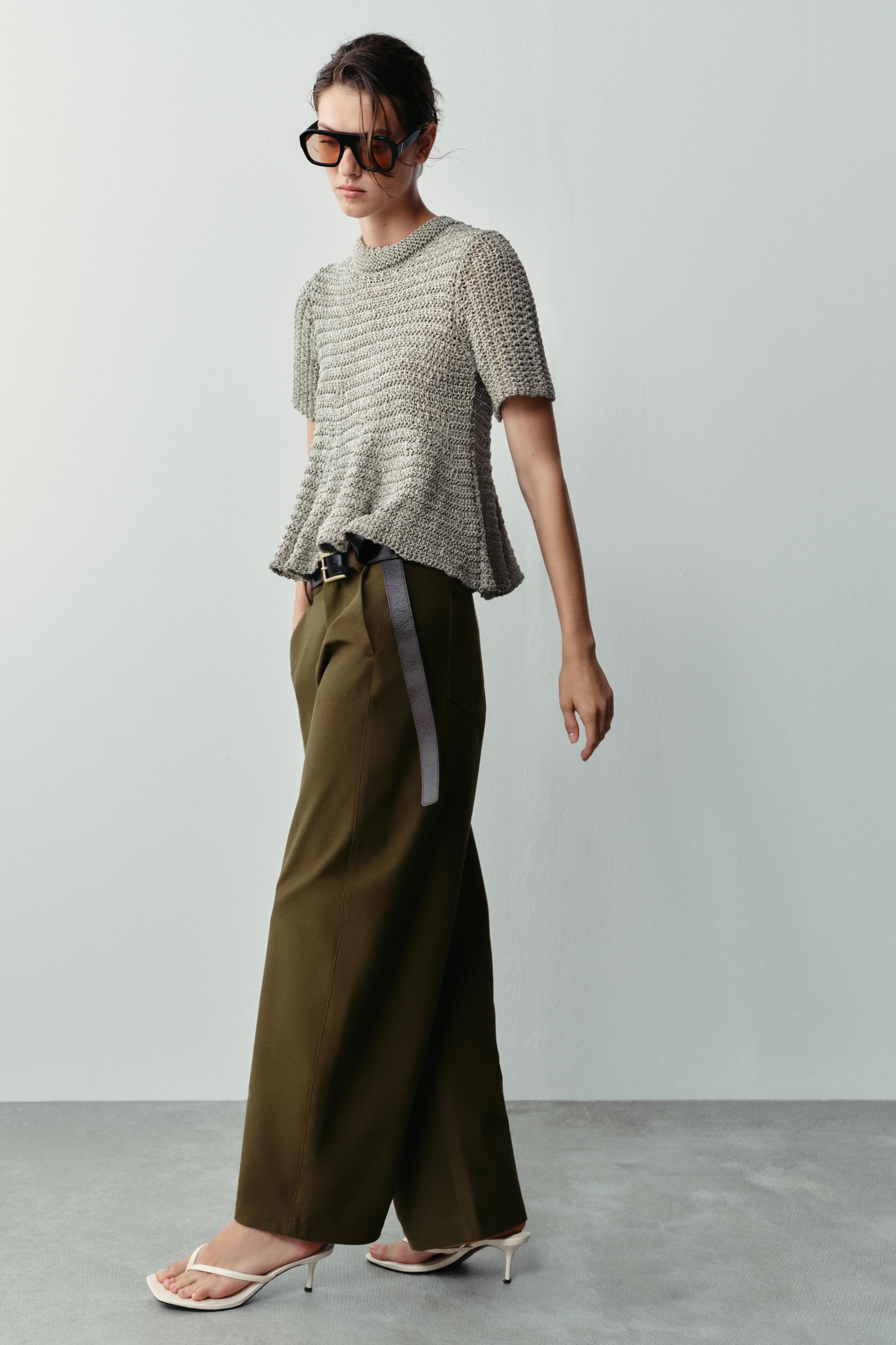 OPEN-KNIT PEPLUM TOP